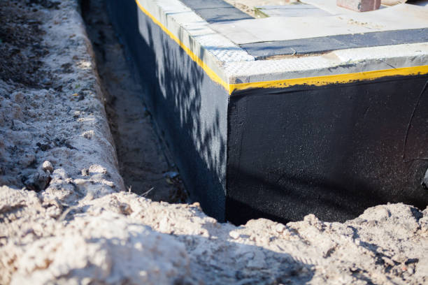 Professional Waterproofing technician working in Lombard, IL